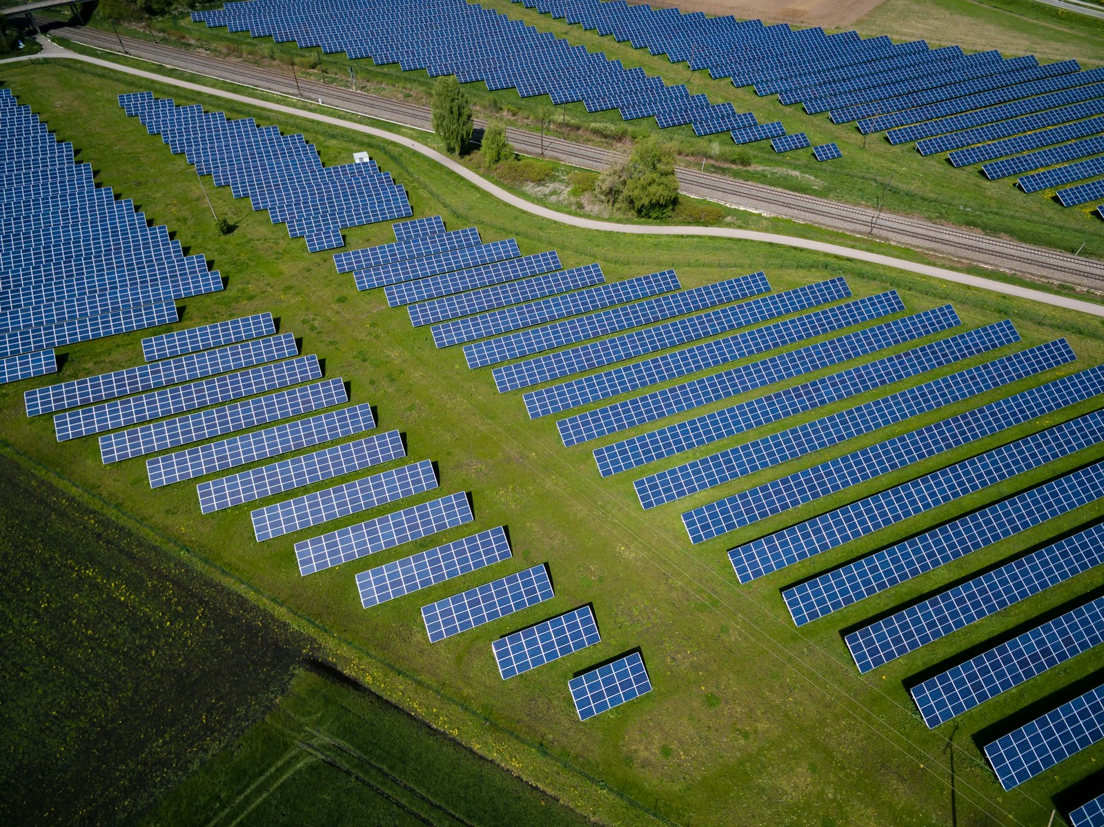 Solar professionals reviewing net-metering documentation